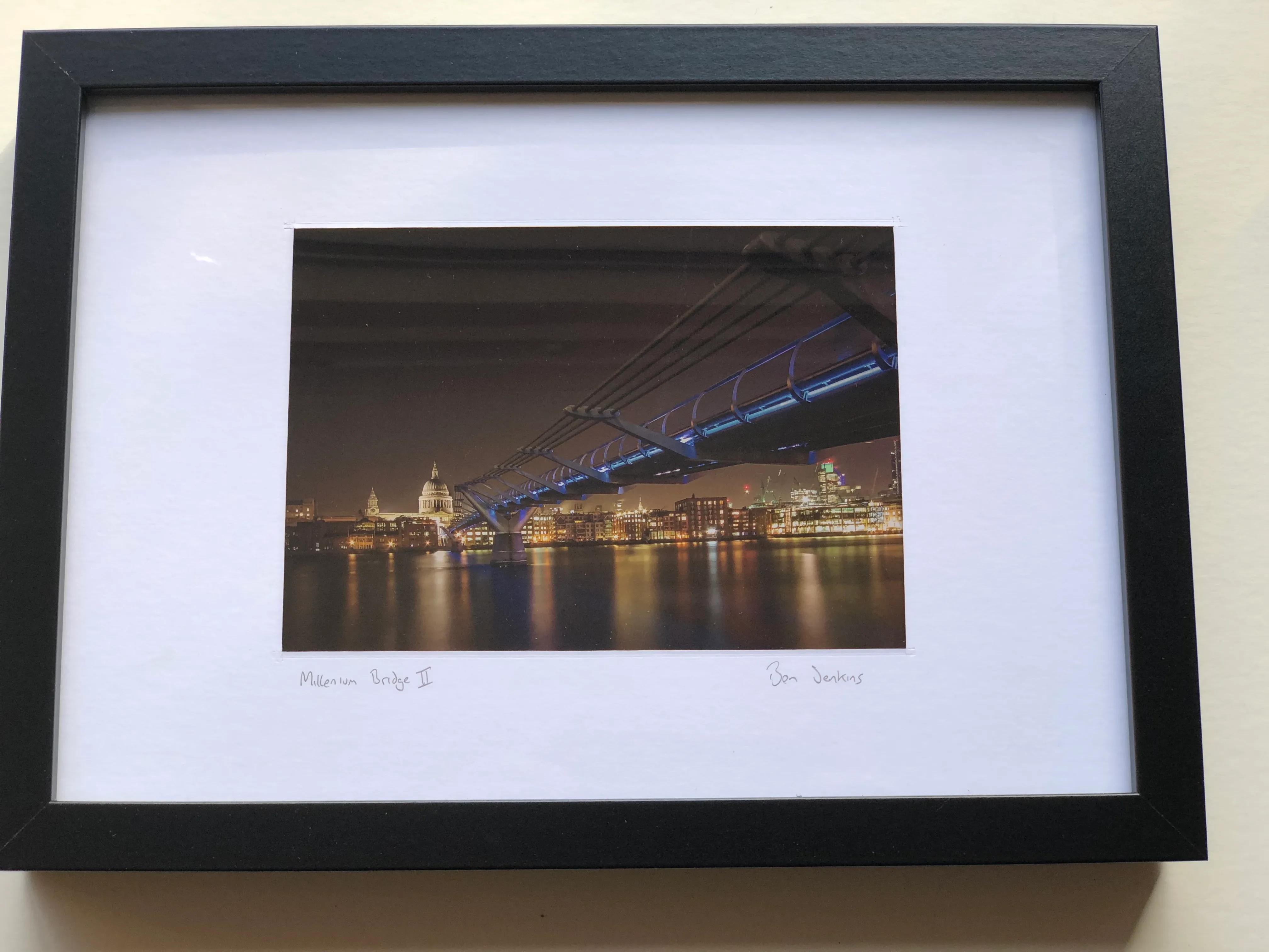 Mounted and framed night photograph of Millennium Bridge in London
